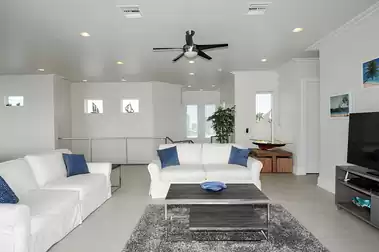 The upper floor has its own living room