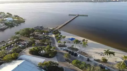 View over the beach and the pier to the river