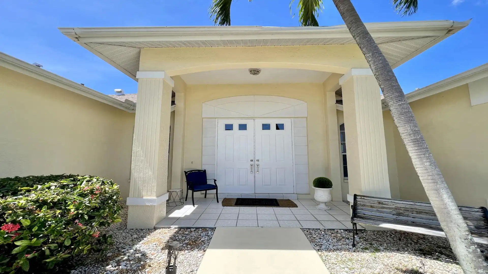 The delicate scent of colorful hibiscus greets you at the front door