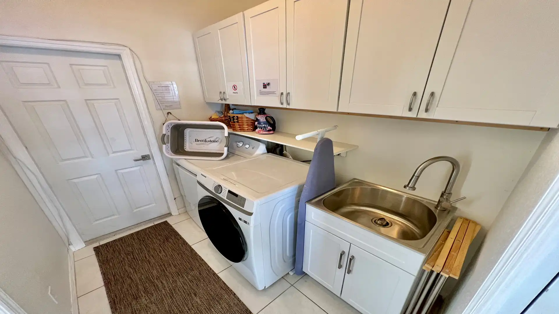 The laundry room is also equipped with the latest appliances