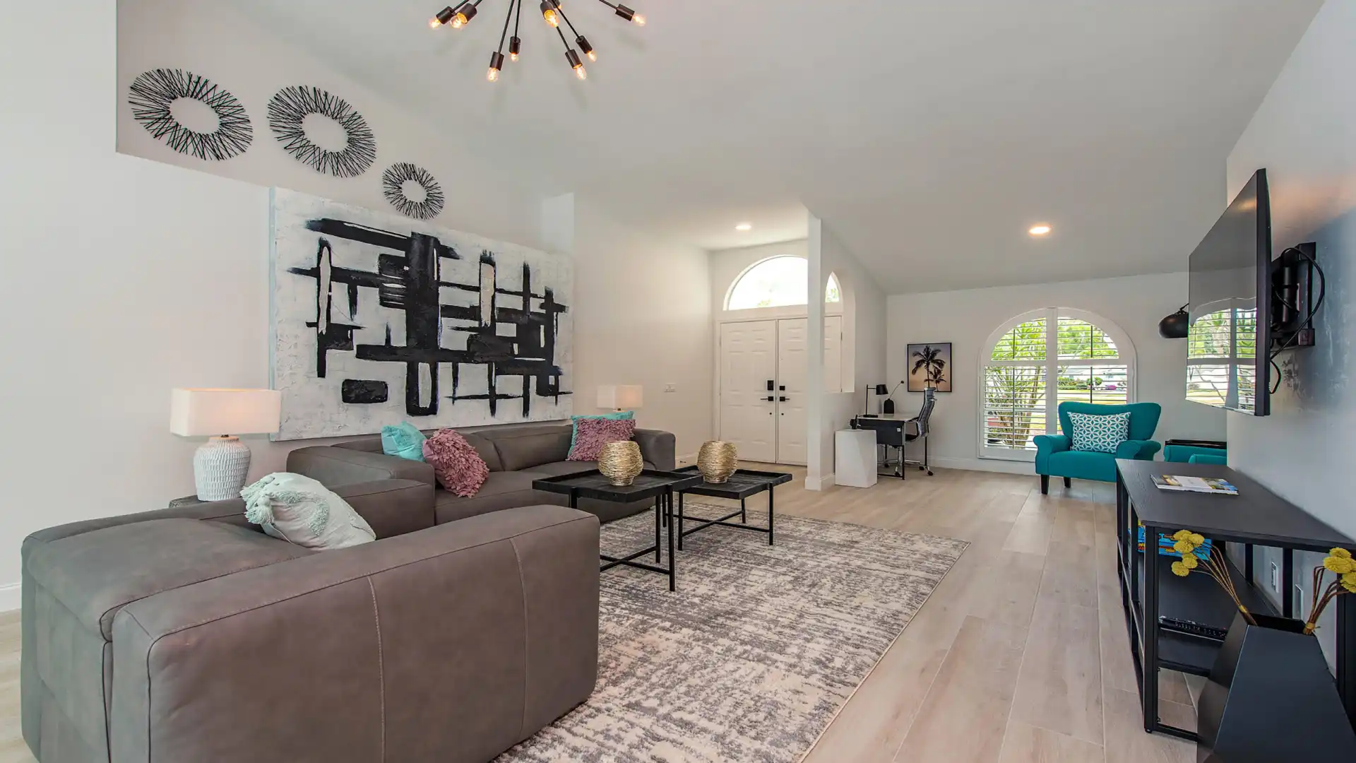 Modern living room with reading corner and desk