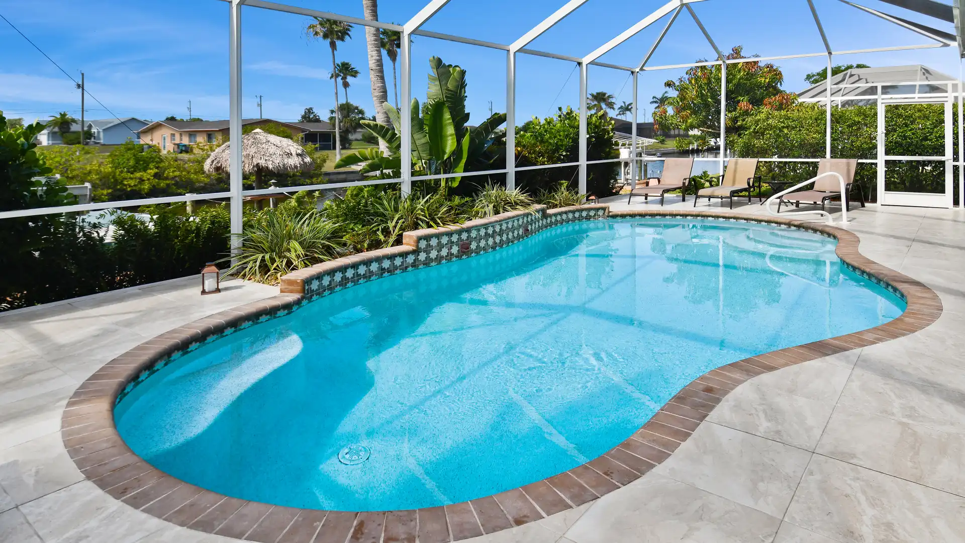 The beautifully shaped pool can be electrically heated