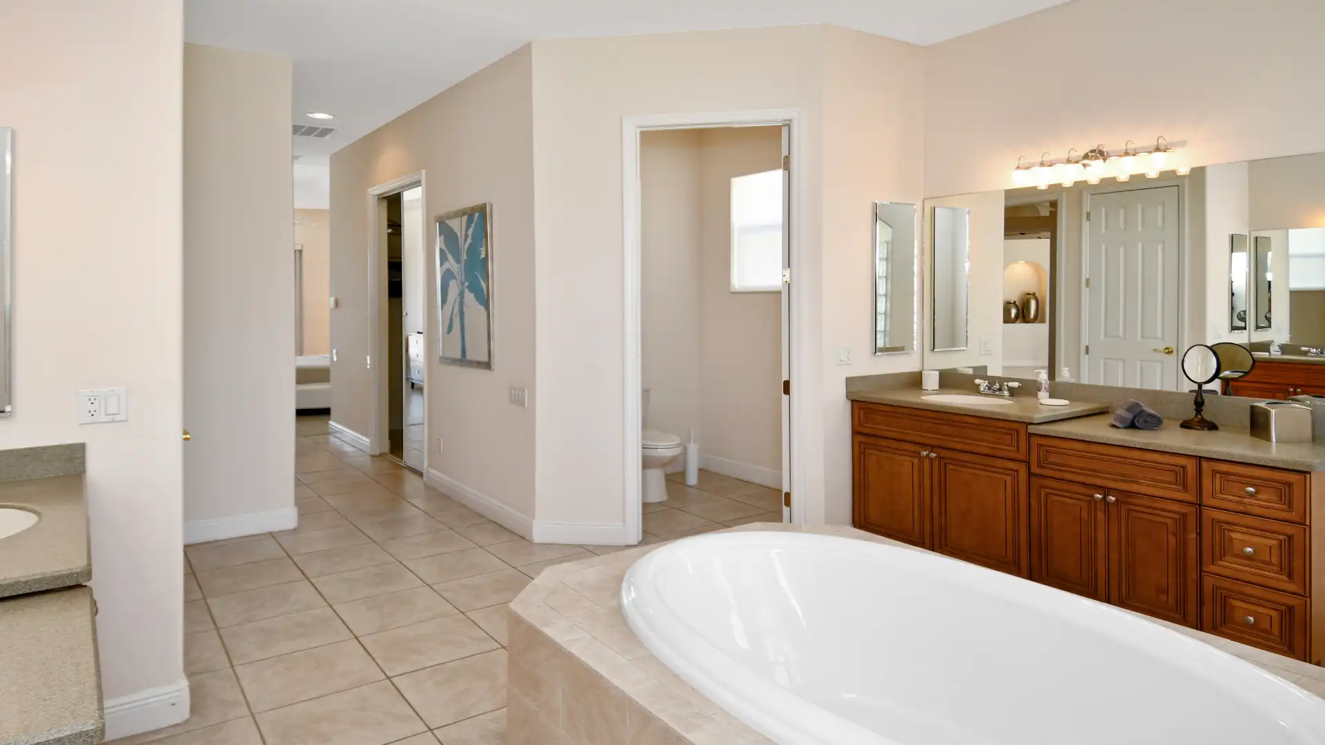 Bathtub, bathroom sink and separate toilet. Everything is there.