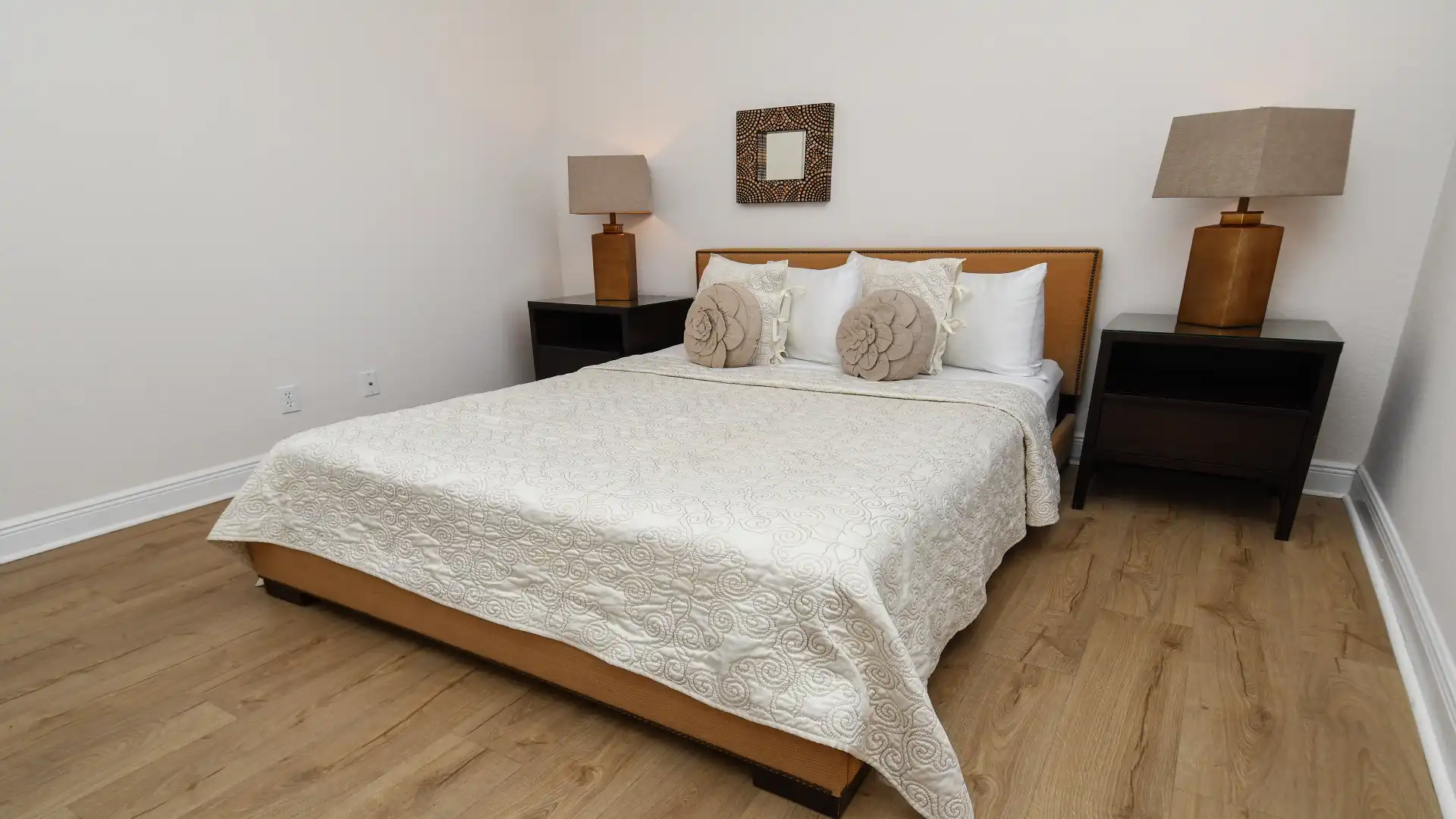 The stylish second bedroom features a Queen size bed