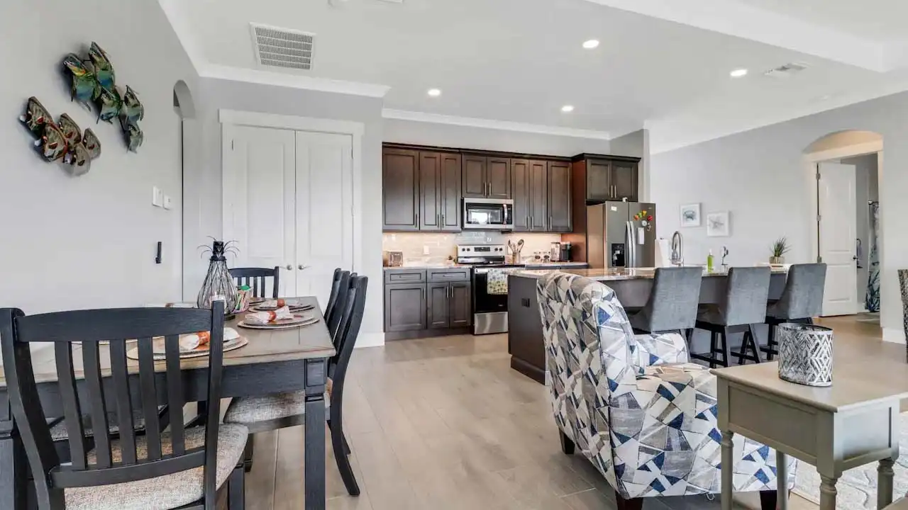 Large, open-plan living area with kitchen and dining table
