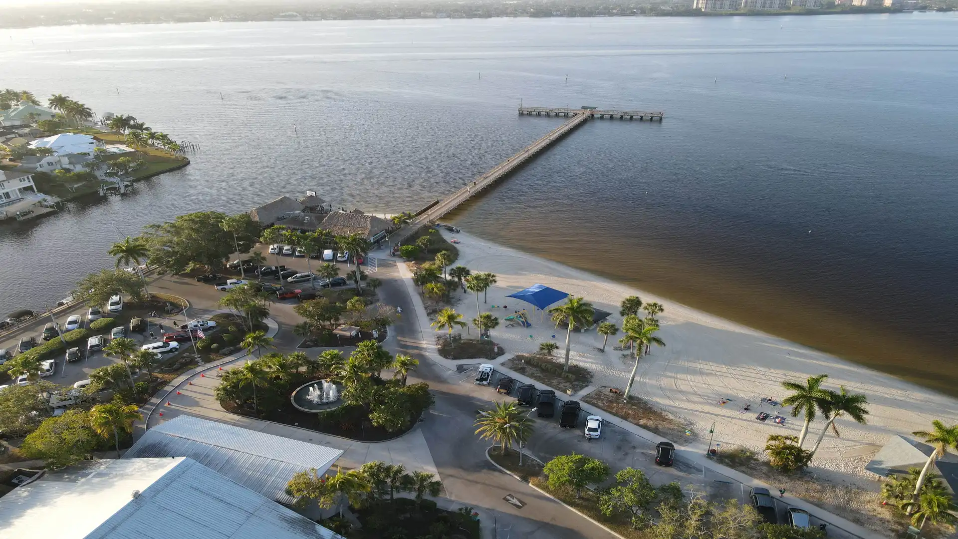 View over the beach and the pier to the river