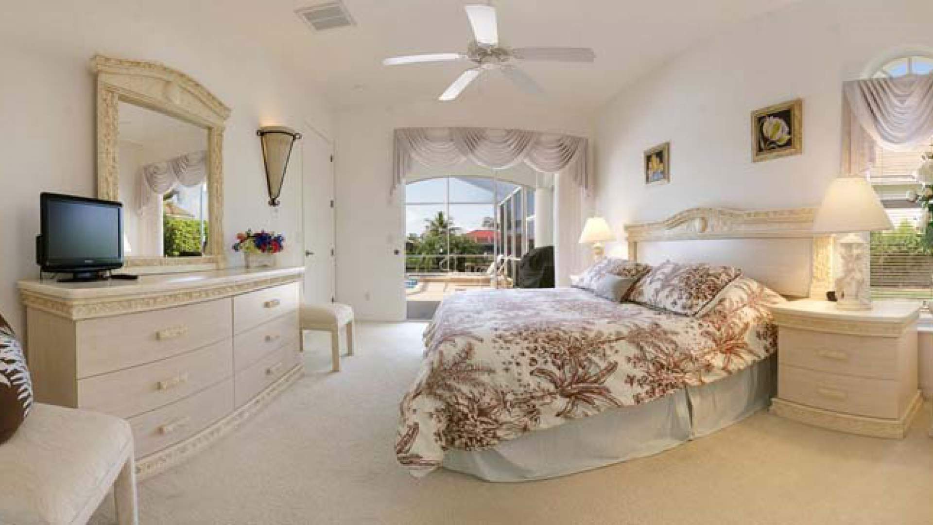 The master bedroom offers elegant furnishings and a King size bed