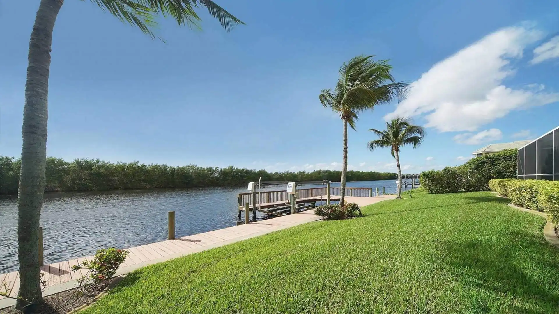 A picturesque view of the canal with adjacent boat dock