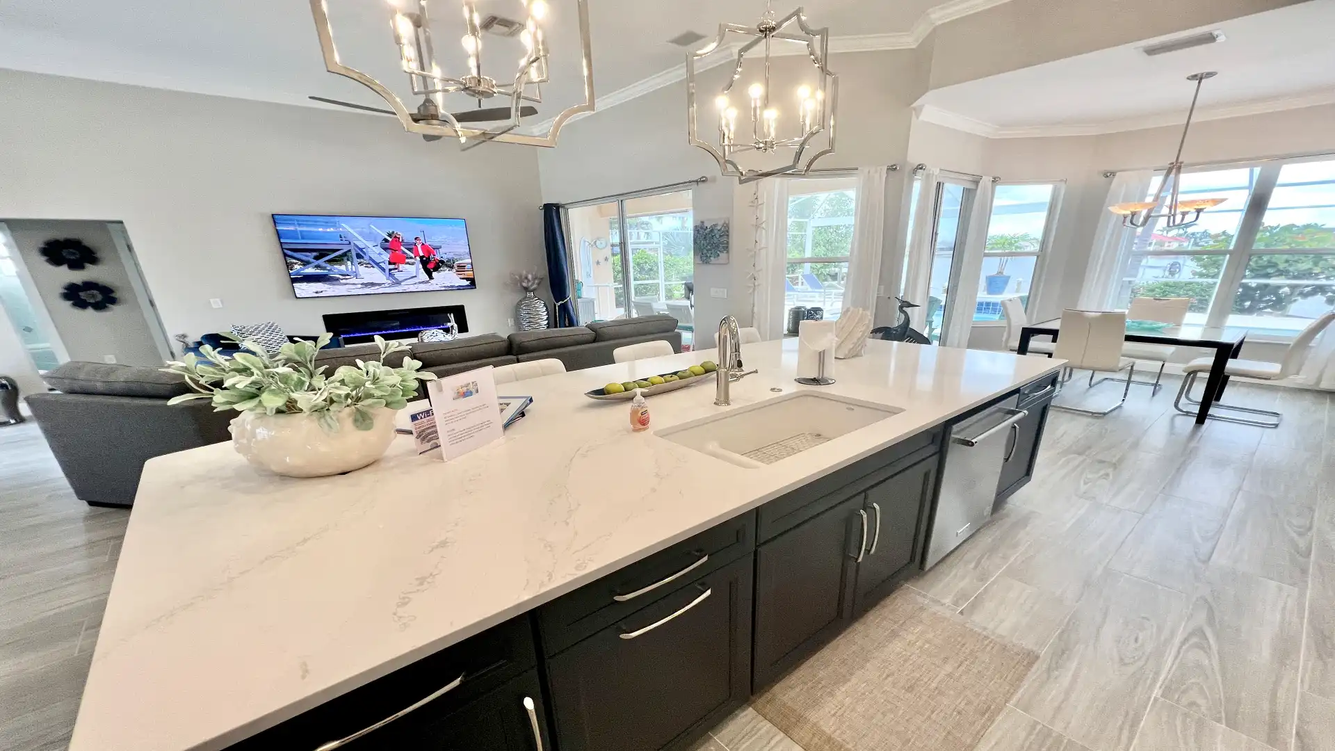 The light and bright breakfast nook offers views of the pool area