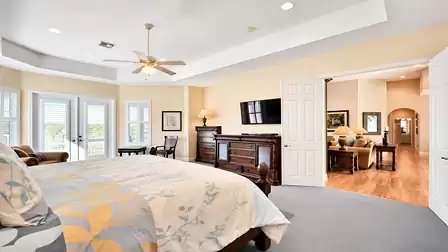 A King size bed is available in this spacious bedroom