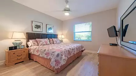 The second bedroom features a Queen size bed