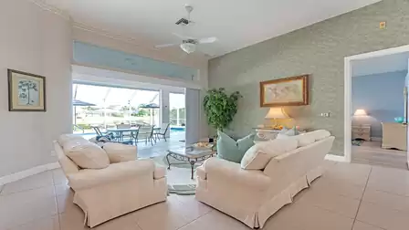 The living room colors are an elegant white and grey