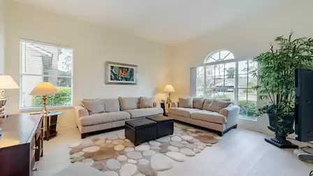 living area withtwo sofas by the entrance area