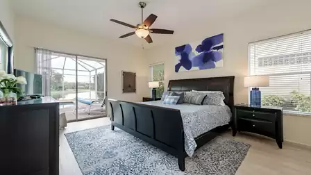 Master bedroom with king size bed and exit to the terrace