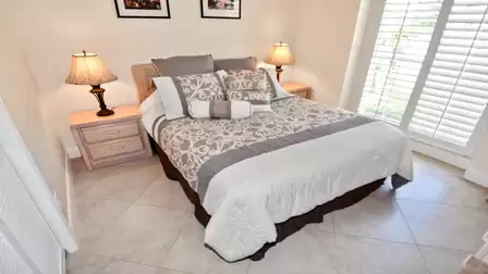 A Queen size bed awaits in the second bedroom