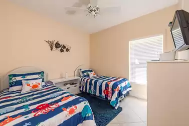 The fourth bedroom features two Twin beds