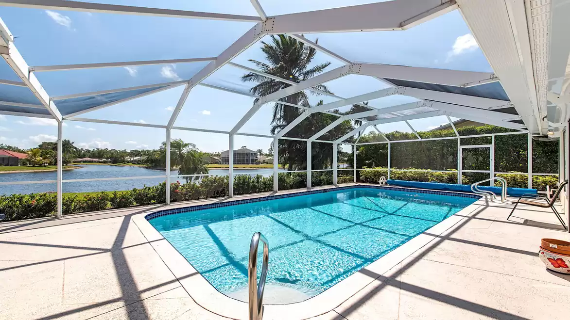 The terrace and pool are surrounded by a white screen
