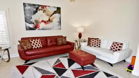 bordeaux and white colored furniture and decoration in the livingroom 